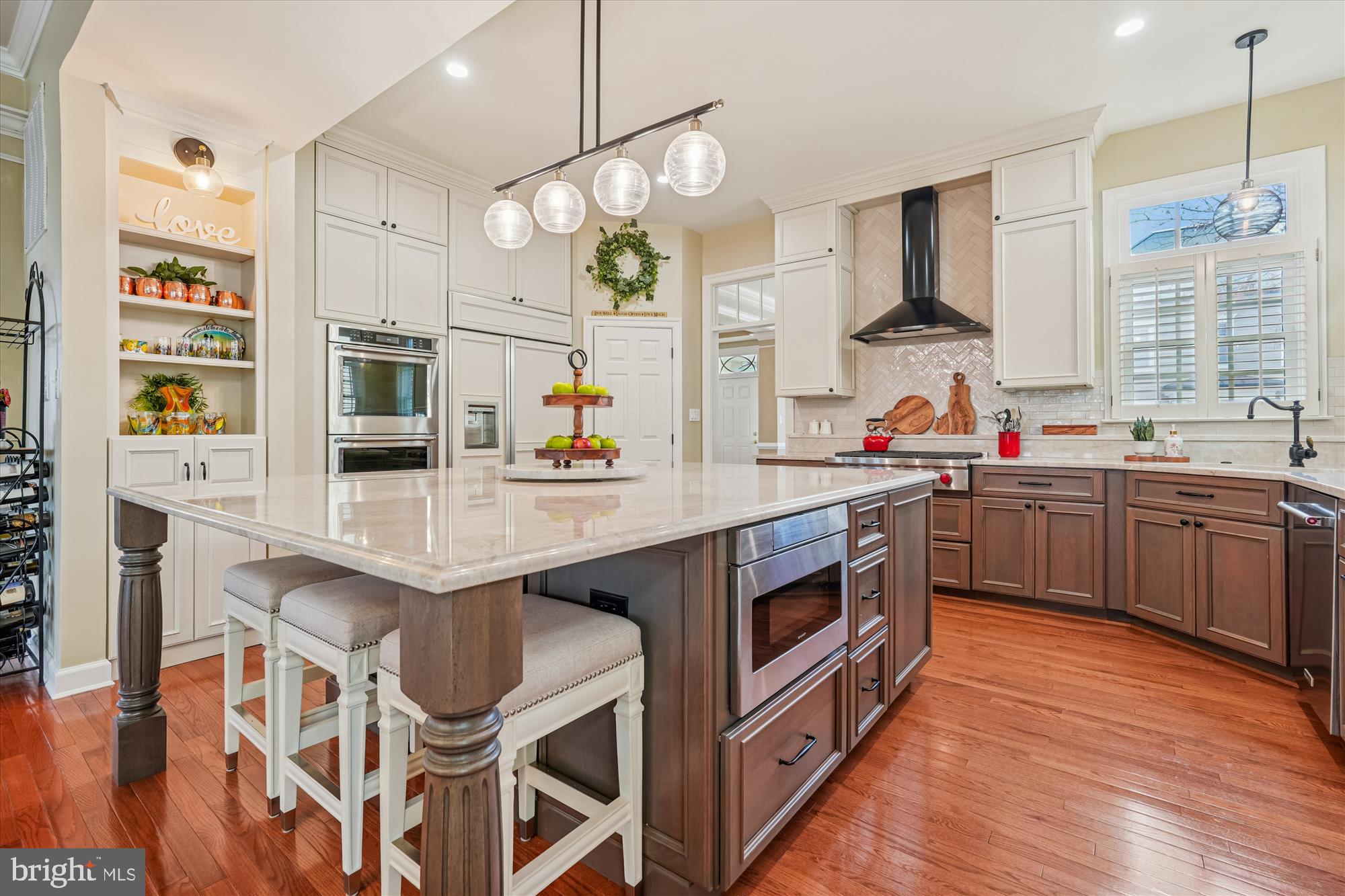 111 Lake Street Gaithersburg, MD 20878 - Photo 3 of 77 a kitchen with stainless steel appliances a sink and a refrigerator