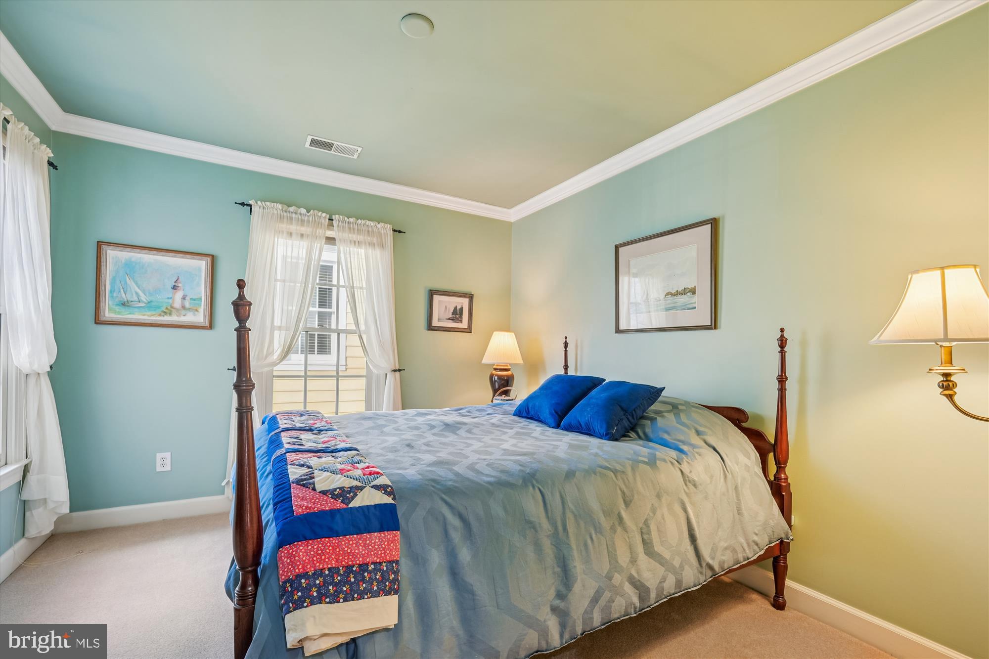 111 Lake Street Gaithersburg, MD 20878 - Photo 33 of 77 a bedroom with a bed and a lamp on dresser