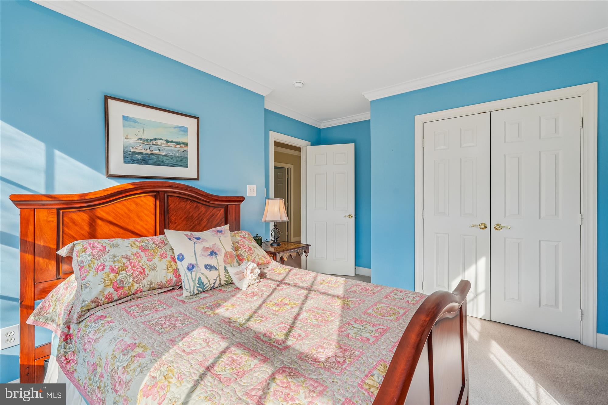 111 Lake Street Gaithersburg, MD 20878 - Photo 41 of 77 a bedroom with a bed and a lamp on dresser