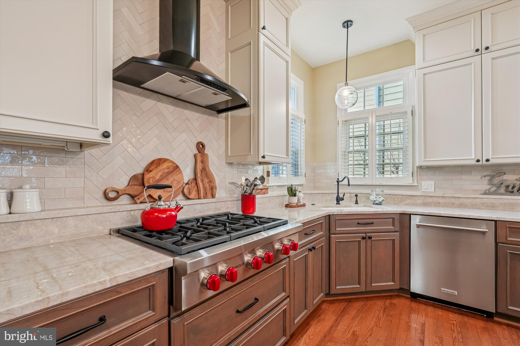 111 Lake Street Gaithersburg, MD 20878 - Photo 5 of 77 a kitchen with a stove a sink and cabinets