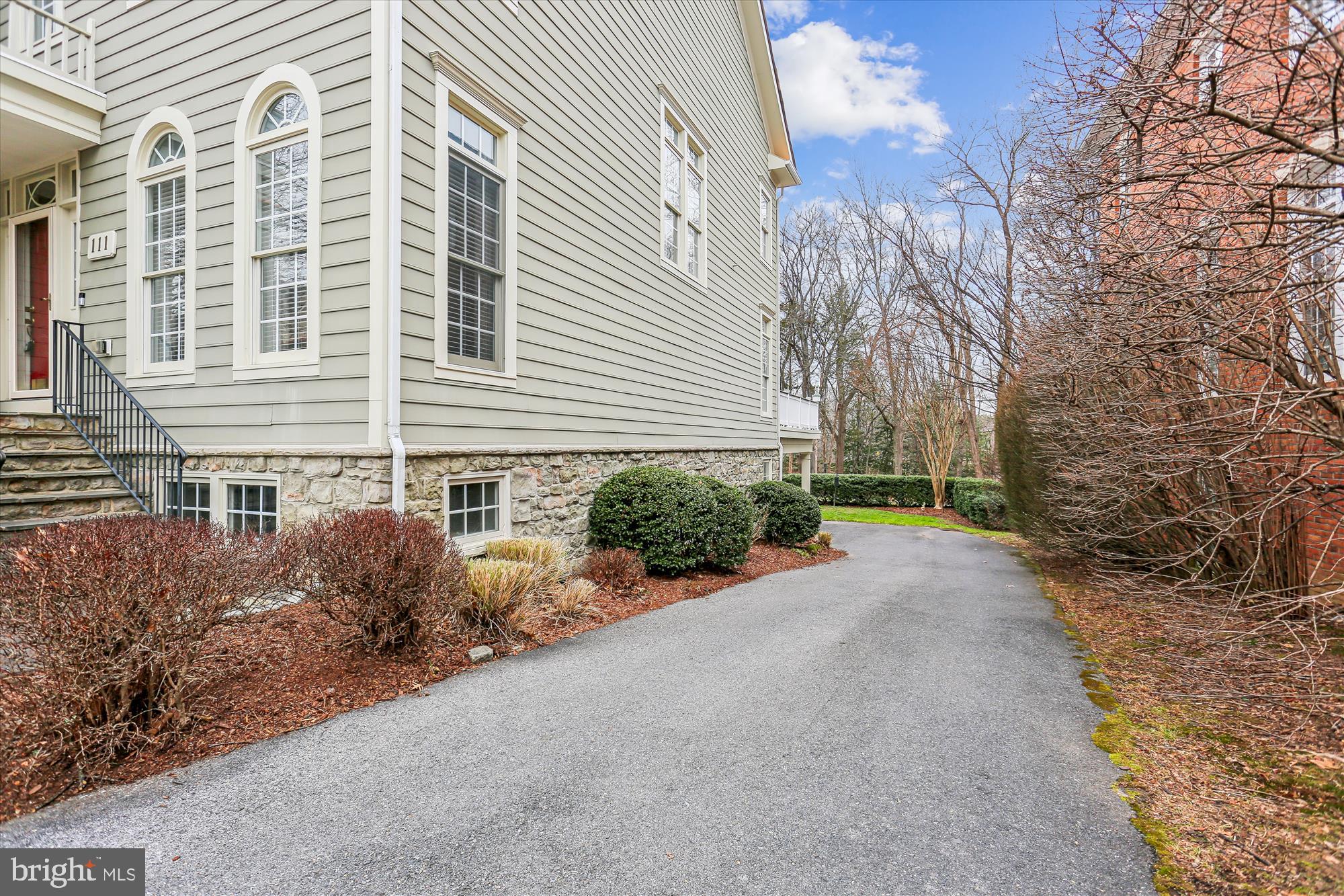 111 Lake Street Gaithersburg, MD 20878 - Photo 56 of 77 a view of a house with garden and plants