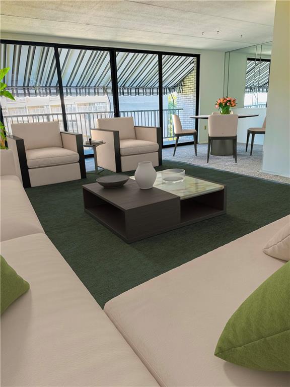 1150 Bower Hill Road, Unit 718B Mt. Lebanon, PA 15243 - Photo 11 of 21 a living room with couch and a large window