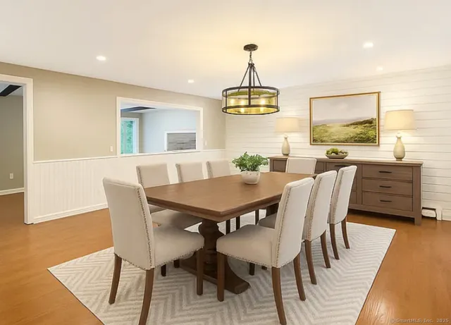 a view of a dining room with furniture