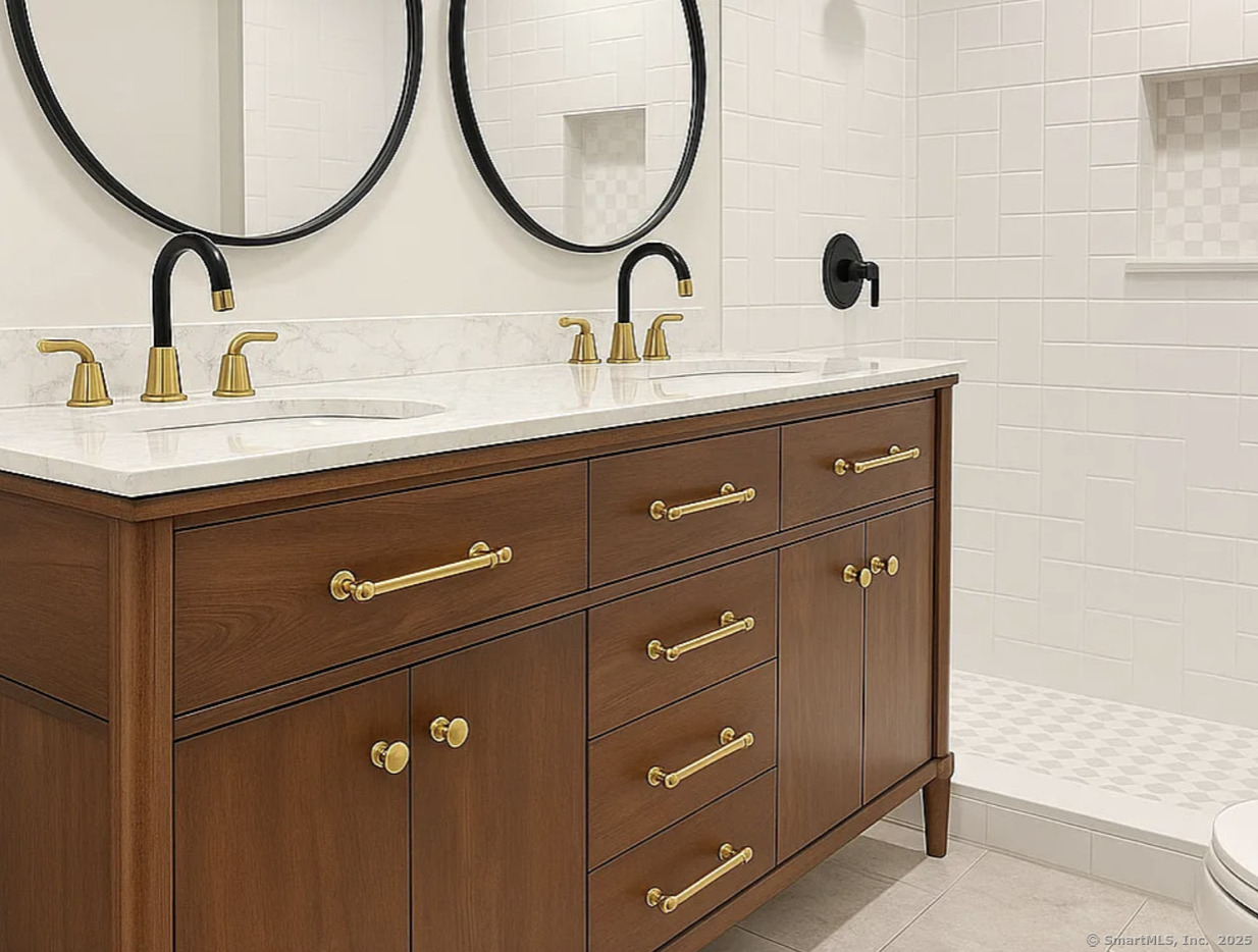 11 Pond Circle Road Westbrook, CT 06498 - Photo 10 of 15 a bathroom with a sink and a mirror