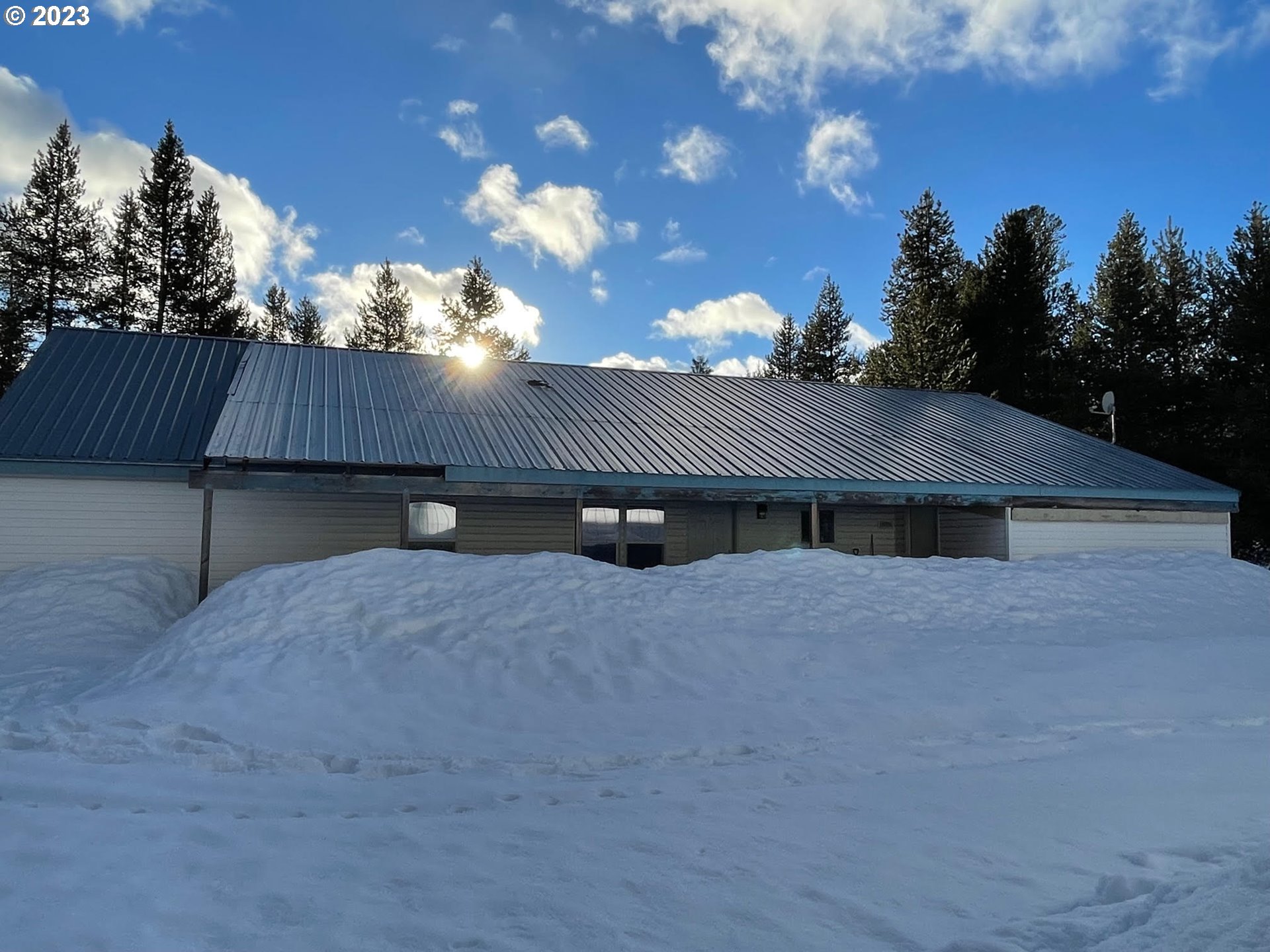 425 Bernard Lane Chemult, OR 97731 - Photo 1 of 32 a house view with a garden space