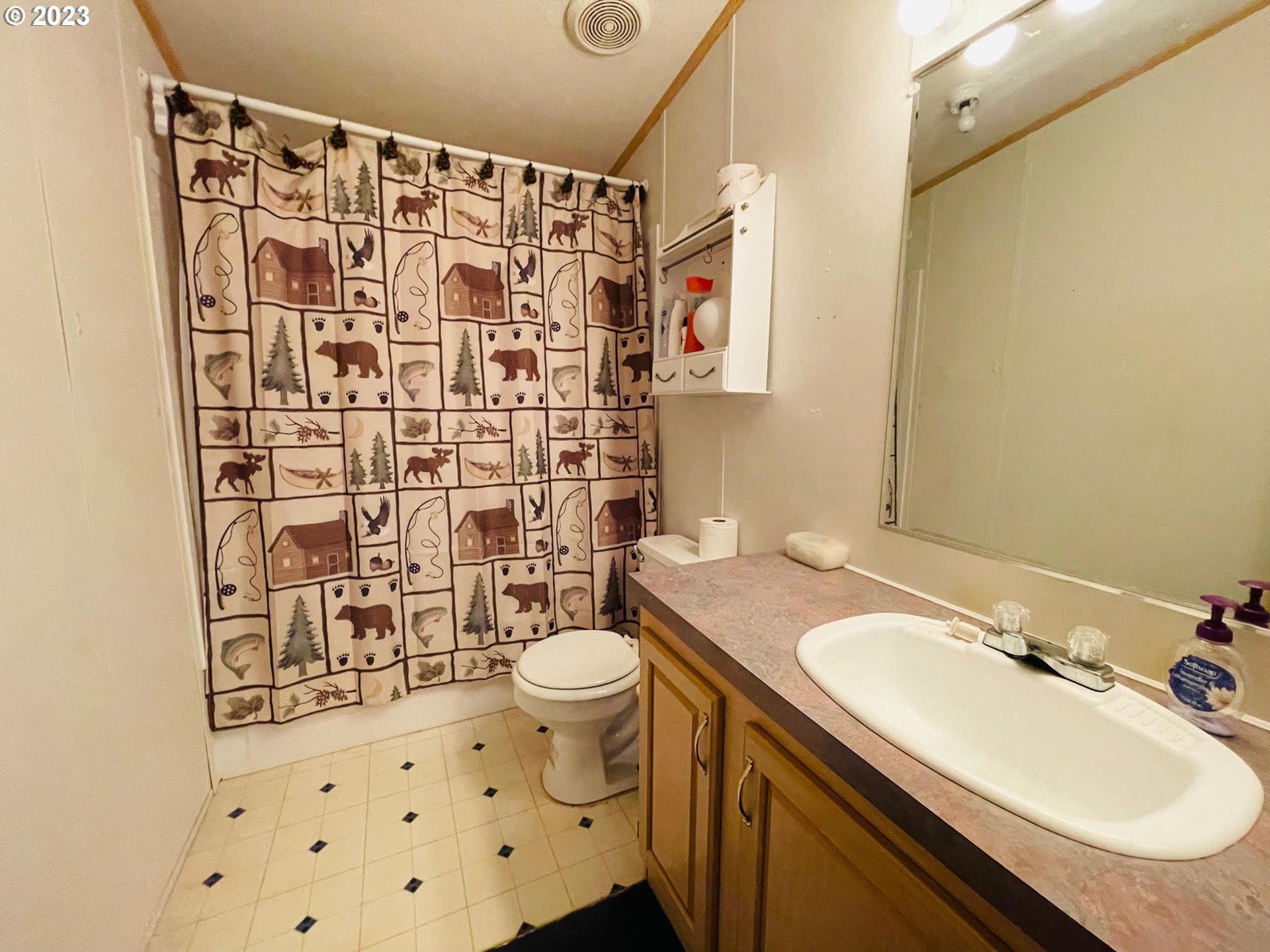 425 Bernard Lane Chemult, OR 97731 - Photo 17 of 32 a bathroom with a sink toilet and shower