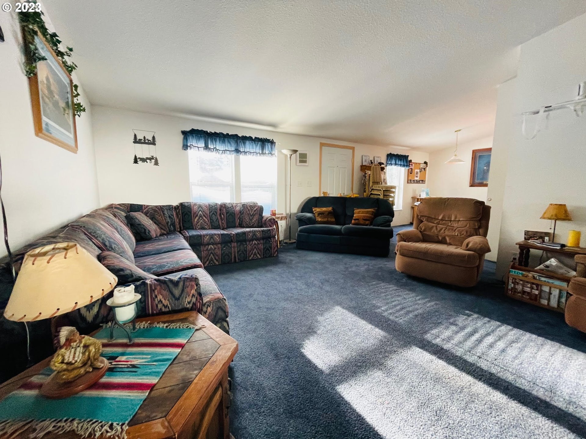 425 Bernard Lane Chemult, OR 97731 - Photo 19 of 32 a living room with furniture and a window