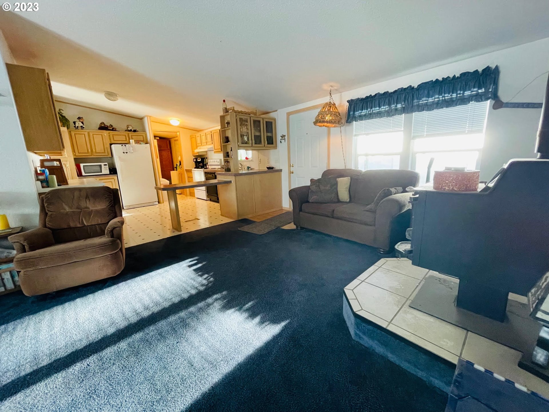 425 Bernard Lane Chemult, OR 97731 - Photo 21 of 32 a living room with furniture and a couch