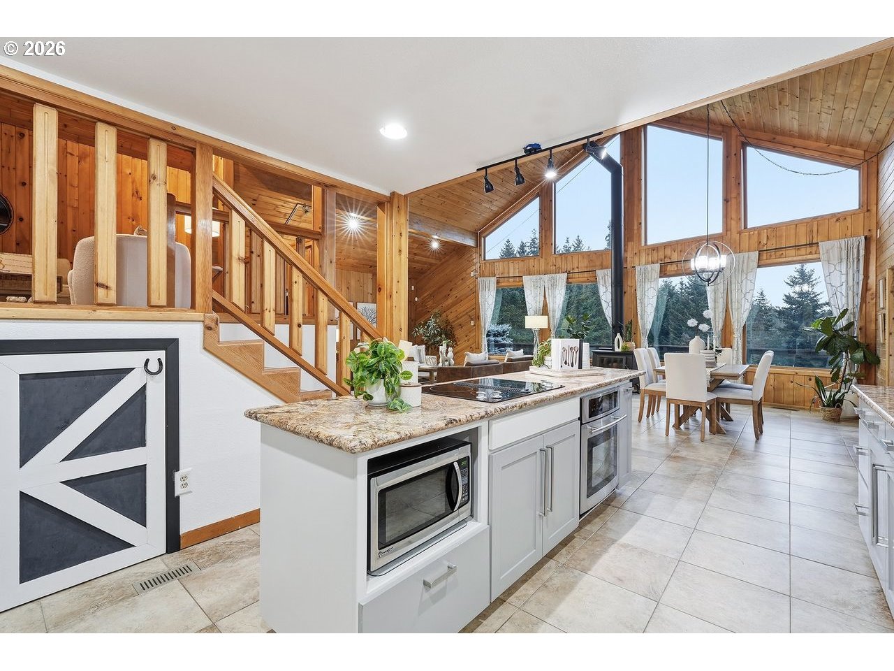 20044 South Fischers Mill Road Oregon City, OR 97045 - Photo 14 of 48 a open kitchen with stainless steel appliances granite countertop a stove and a view of living room
