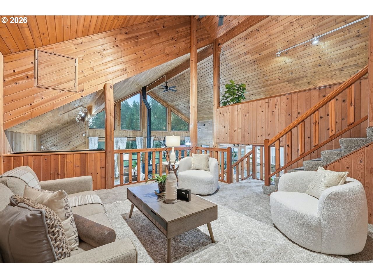20044 South Fischers Mill Road Oregon City, OR 97045 - Photo 19 of 48 a living room with furniture a large window and wooden floor