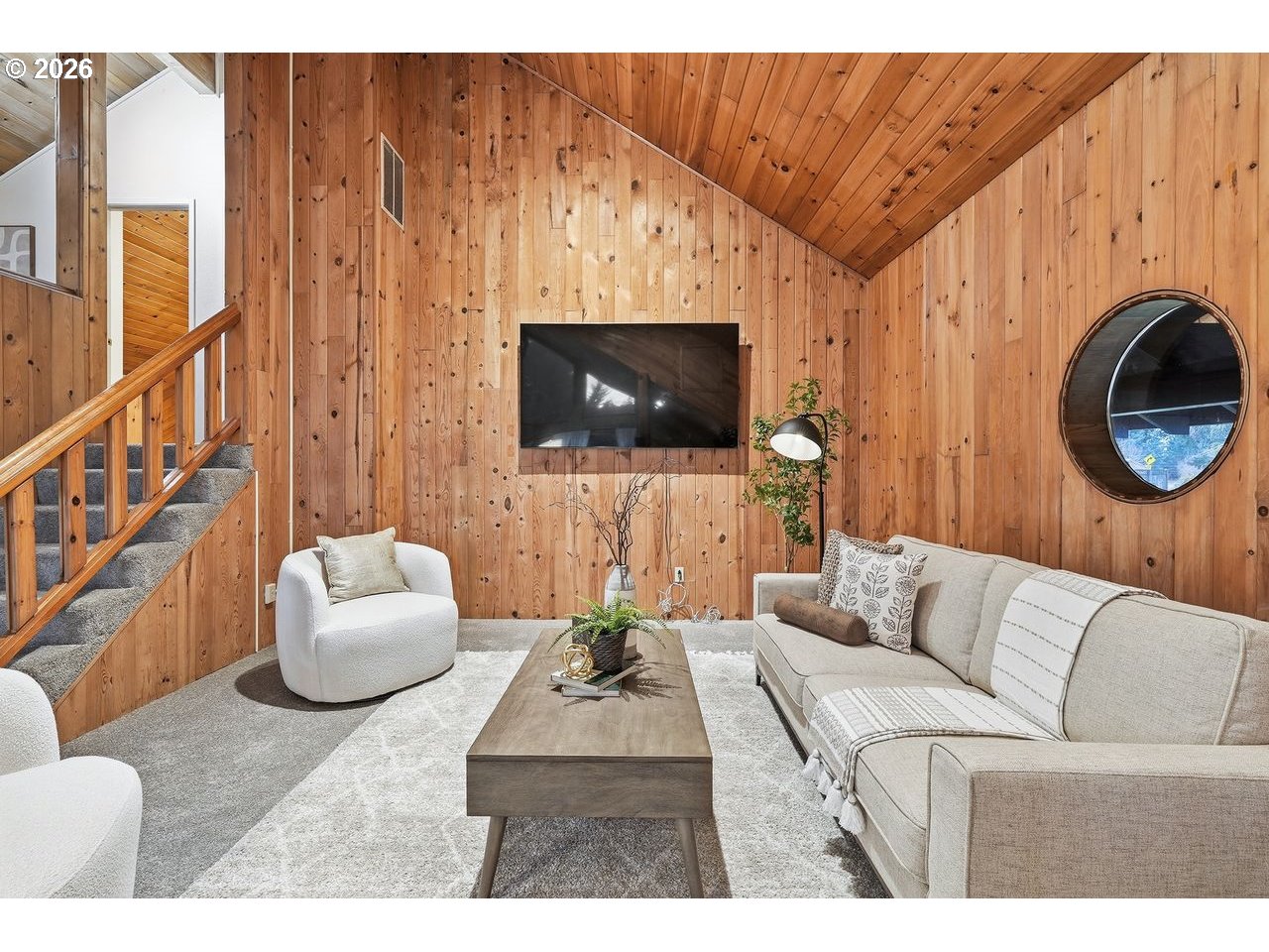 20044 South Fischers Mill Road Oregon City, OR 97045 - Photo 20 of 48 a living room with furniture and a flat screen tv