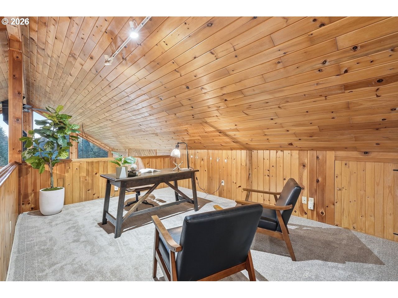 20044 South Fischers Mill Road Oregon City, OR 97045 - Photo 21 of 48 a dining room with furniture and a potted plant