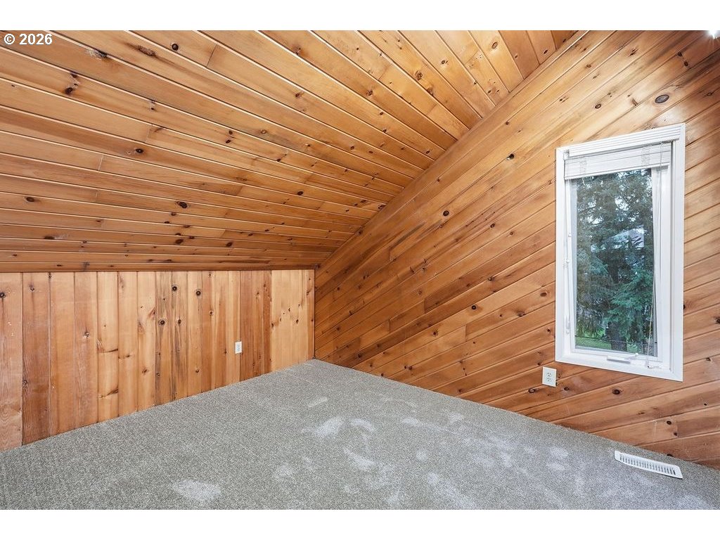 20044 South Fischers Mill Road Oregon City, OR 97045 - Photo 23 of 48 a view of a room with wooden walls and windows