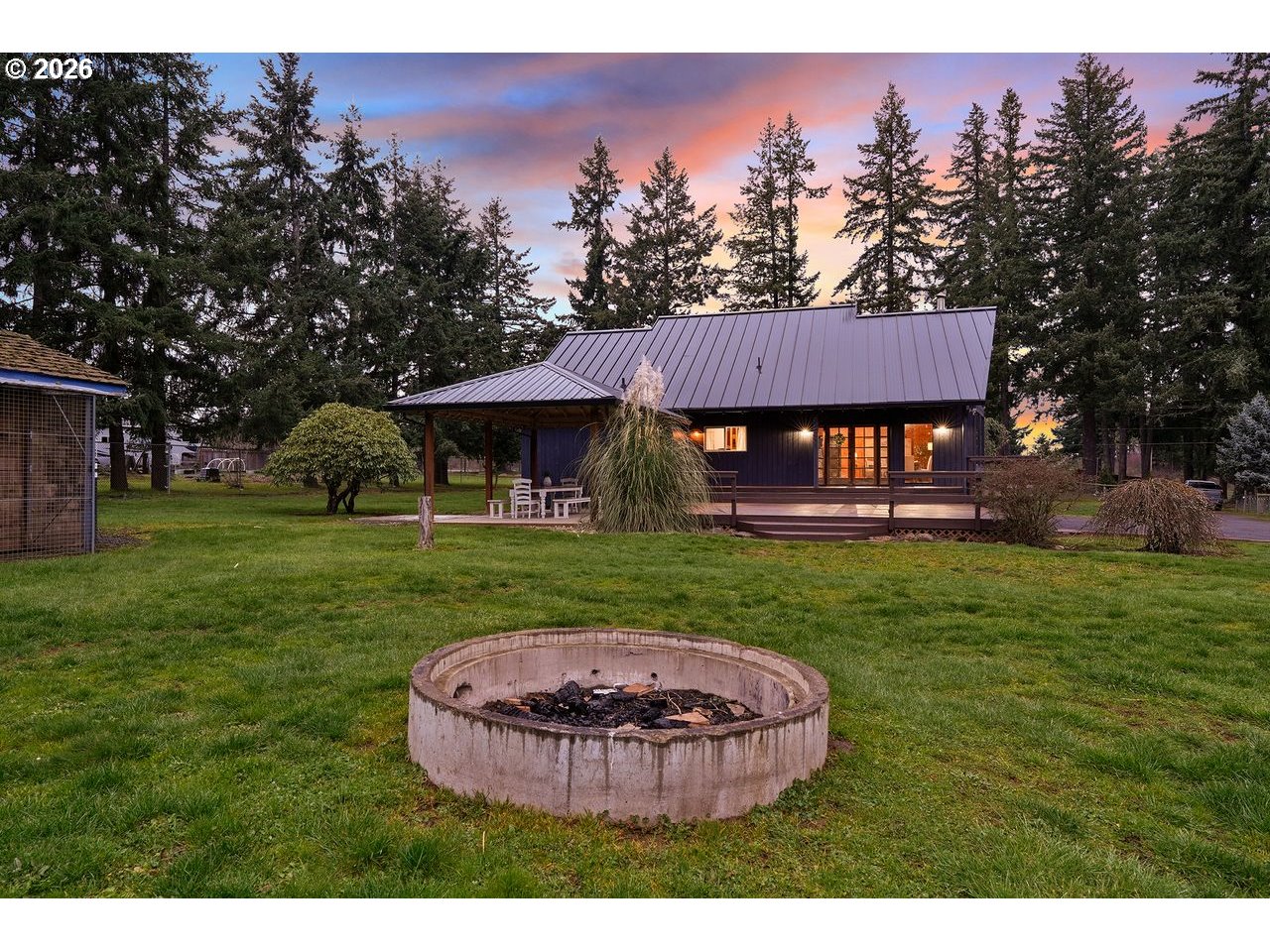 20044 South Fischers Mill Road Oregon City, OR 97045 - Photo 30 of 48 a view of a house with a backyard