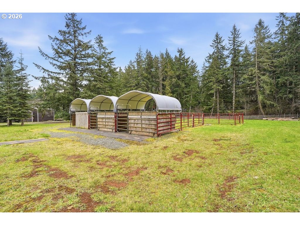20044 South Fischers Mill Road Oregon City, OR 97045 - Photo 38 of 48 a aerial view of a house with swimming pool and big yard