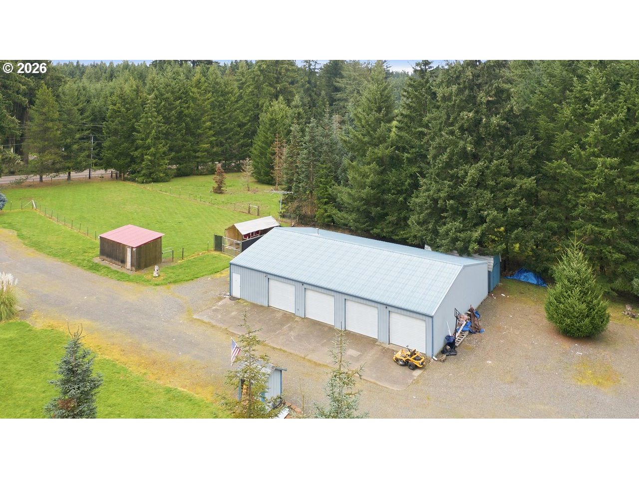 20044 South Fischers Mill Road Oregon City, OR 97045 - Photo 45 of 48 a backyard of a house with a yard and outdoor seating