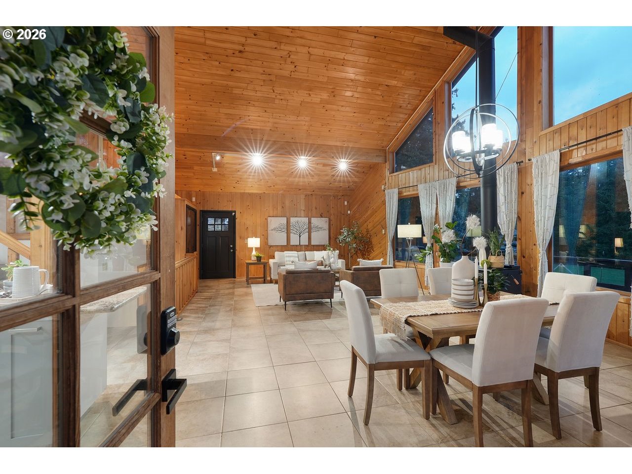 20044 South Fischers Mill Road Oregon City, OR 97045 - Photo 5 of 48 a dining room with furniture and a potted plant