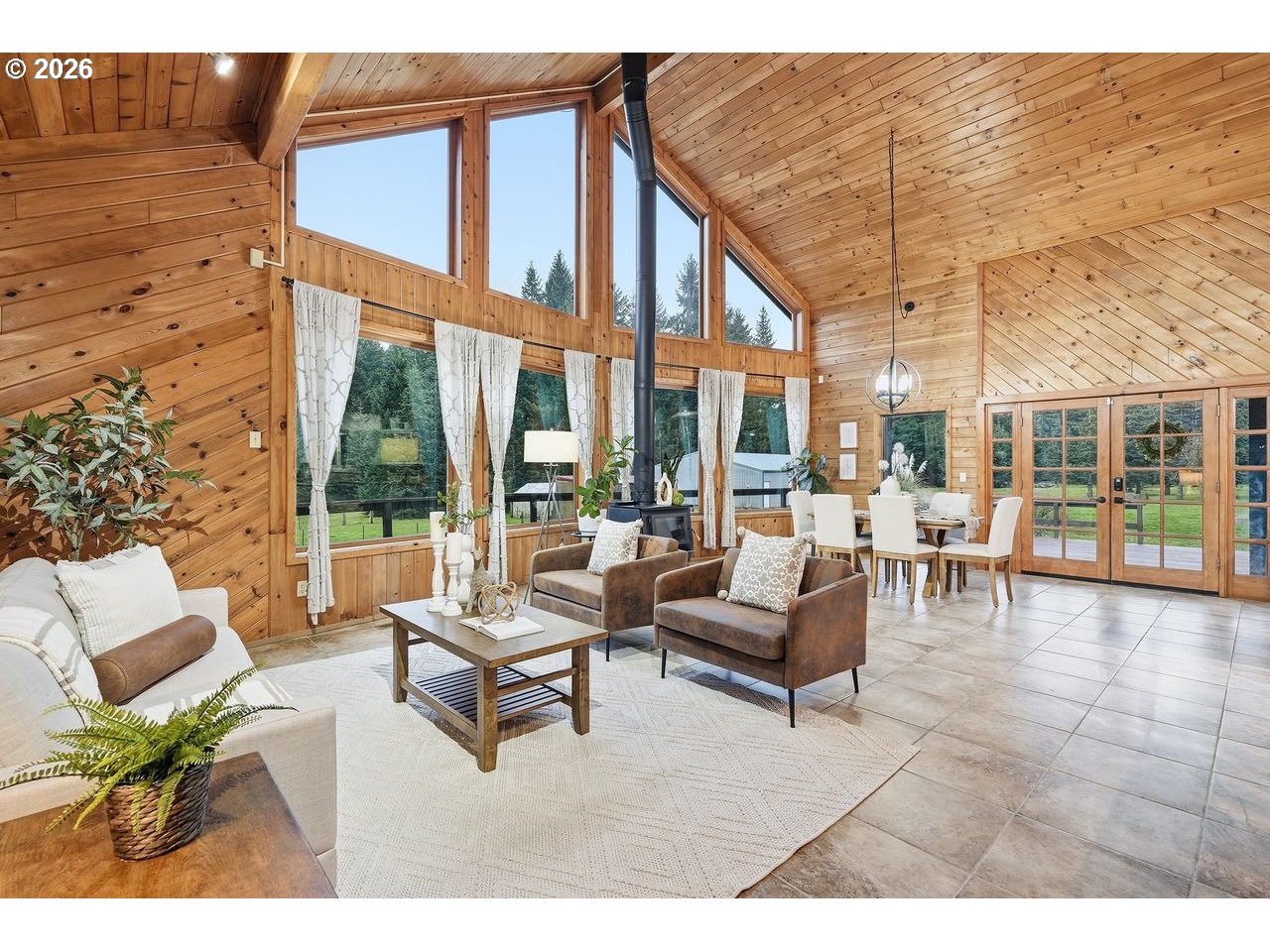 20044 South Fischers Mill Road Oregon City, OR 97045 - Photo 6 of 48 a building outdoor space with patio furniture and glass door