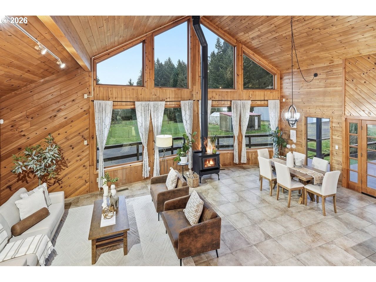 20044 South Fischers Mill Road Oregon City, OR 97045 - Photo 9 of 48 a living room with furniture and large windows