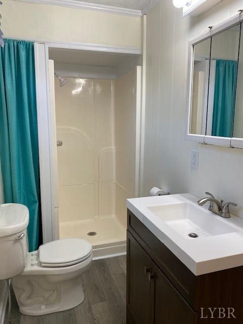 302 Prospect Road Hurt, VA 24563 - Photo 6 of 9 a bathroom with a sink toilet and shower