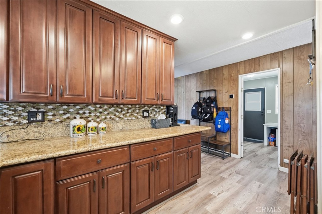 15181 Van Buren Boulevard, Unit 85 Riverside, CA 92504 - Photo 13 of 54 a kitchen with a sink and cabinets