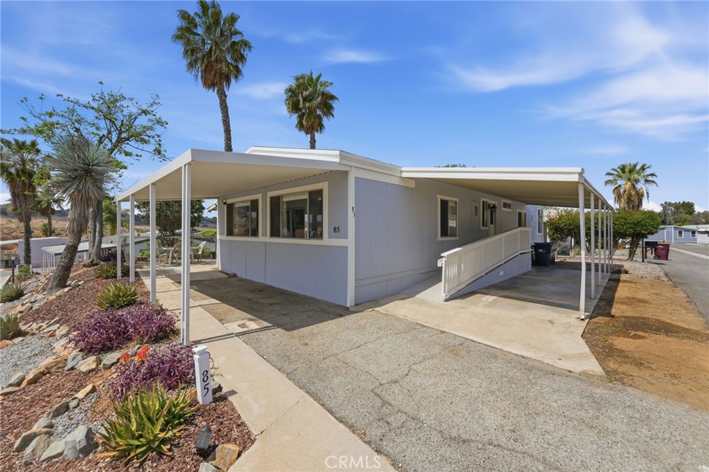 15181 Van Buren Boulevard, Unit 85 Riverside, CA 92504 - Photo 24 of 54 a view of a house with a patio