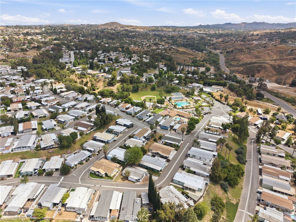 15181 Van Buren Boulevard, Unit 85 Riverside, CA 92504 - Photo 32 of 54 an aerial view of multiple house