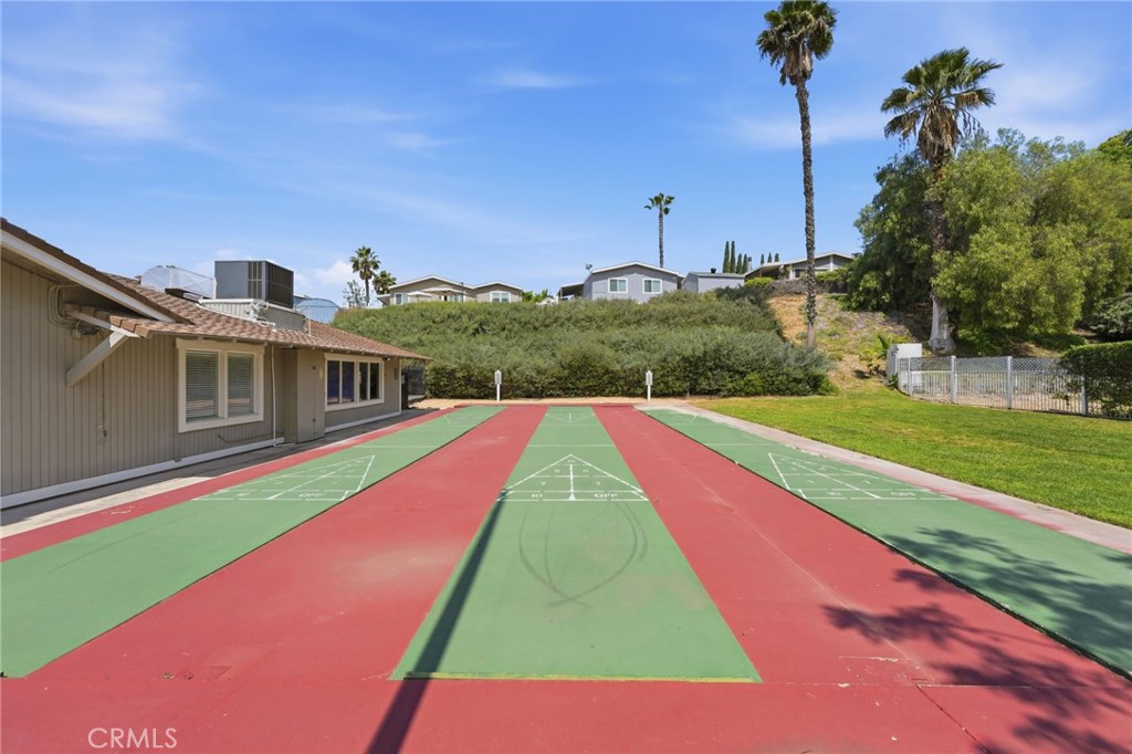15181 Van Buren Boulevard, Unit 85 Riverside, CA 92504 - Photo 40 of 54 a view of a yard with swimming pool