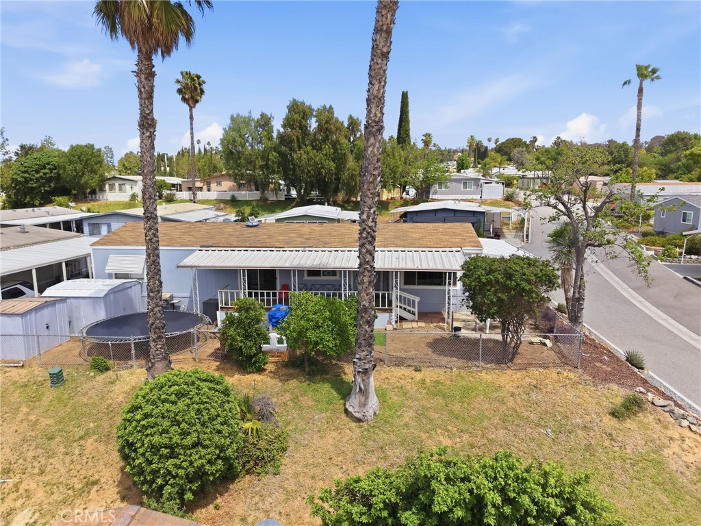 15181 Van Buren Boulevard, Unit 85 Riverside, CA 92504 - Photo 4 of 54 a view of a swimming pool and a terrace