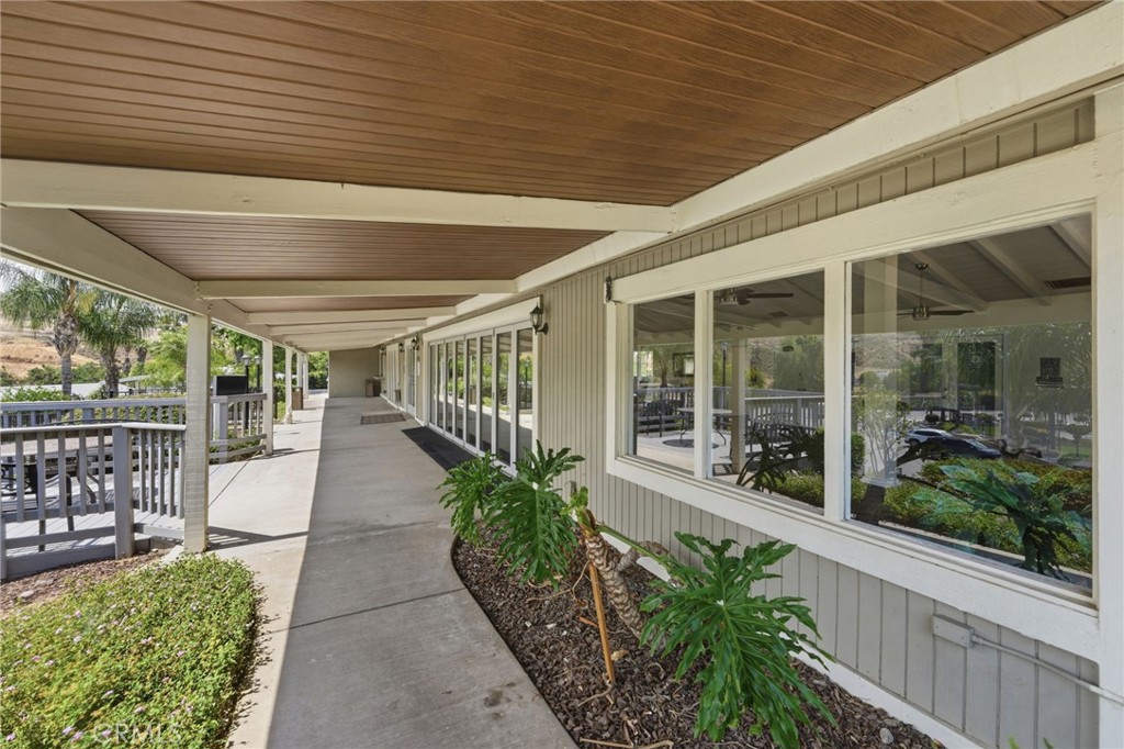 15181 Van Buren Boulevard, Unit 85 Riverside, CA 92504 - Photo 46 of 54 a porch with seating space