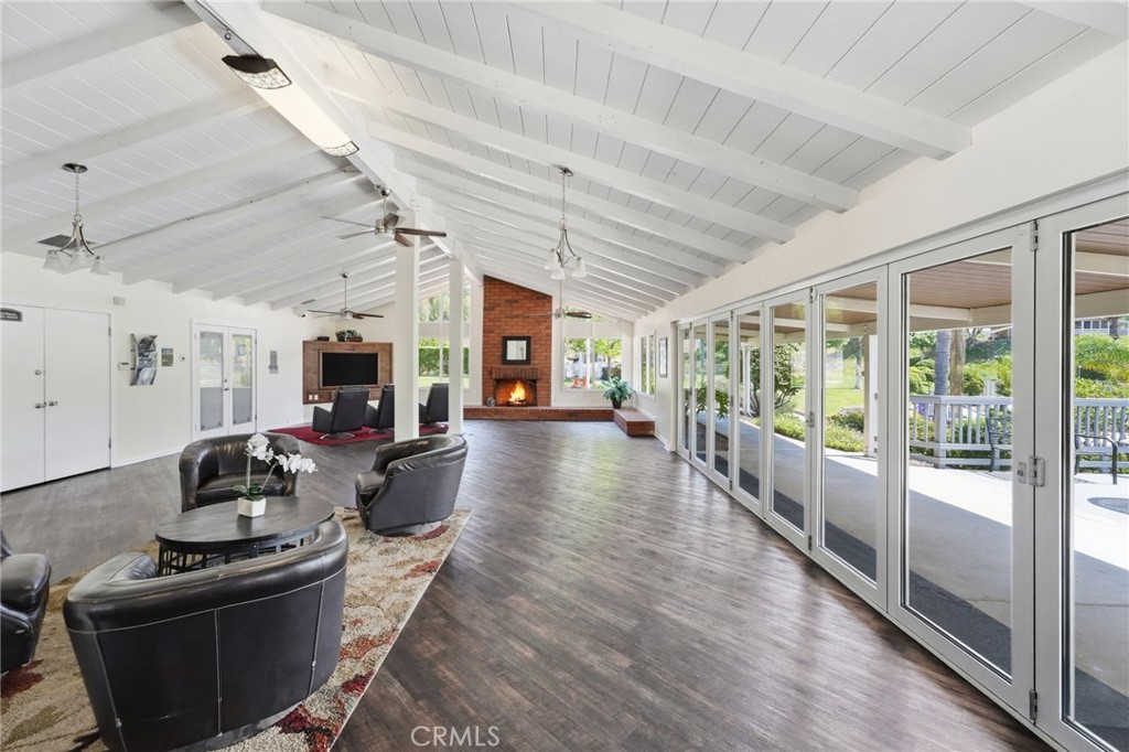 15181 Van Buren Boulevard, Unit 85 Riverside, CA 92504 - Photo 50 of 54 a view of a room with wooden floor