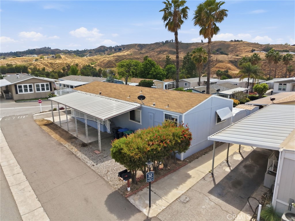 15181 Van Buren Boulevard, Unit 85 Riverside, CA 92504 - Photo 6 of 54 a view of a terrace with a table and chairs