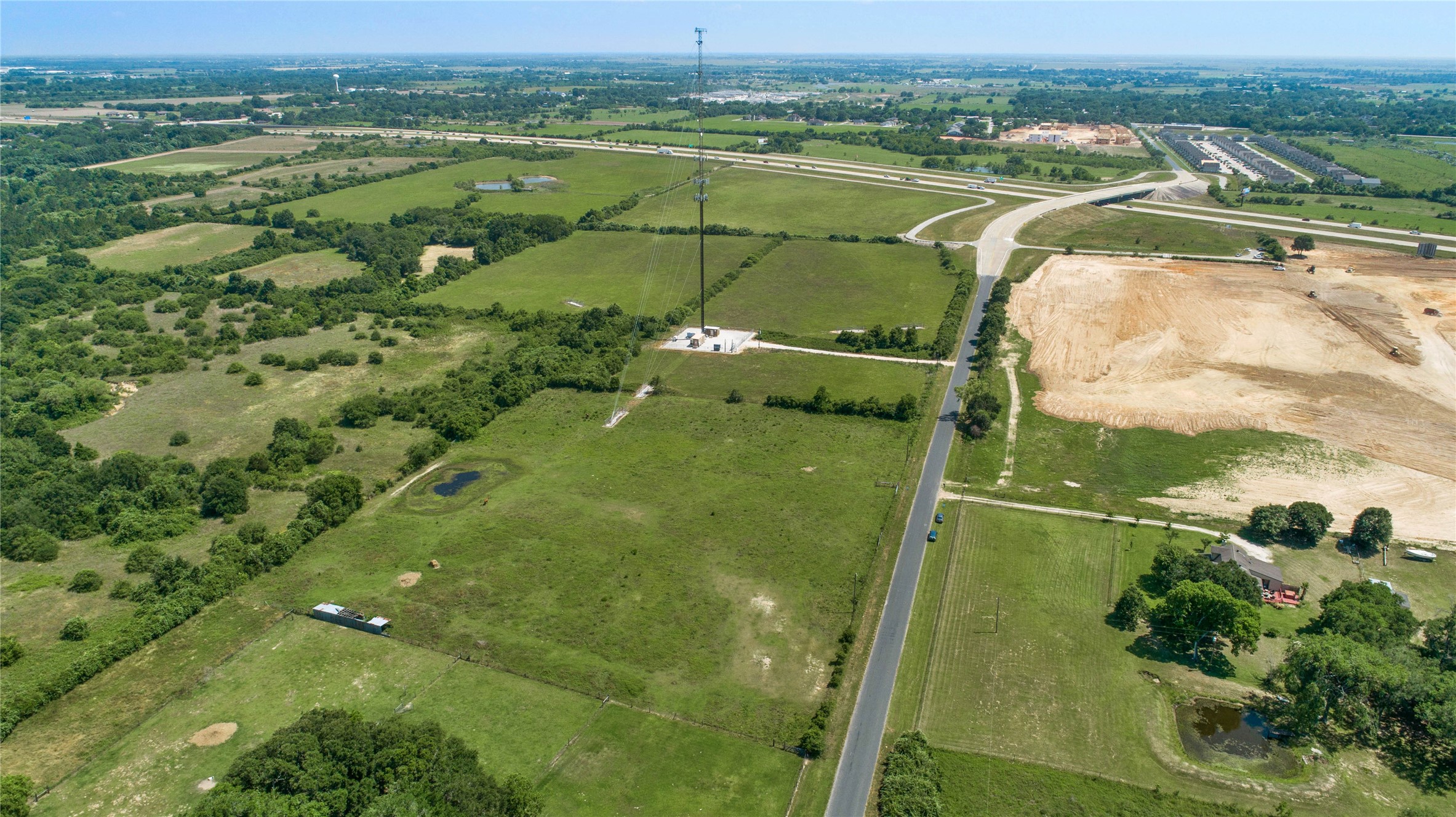 Lot 1 Richards Road Prairie View, TX 77445 - Photo 15 of 16 an aerial view of a houses with a lake