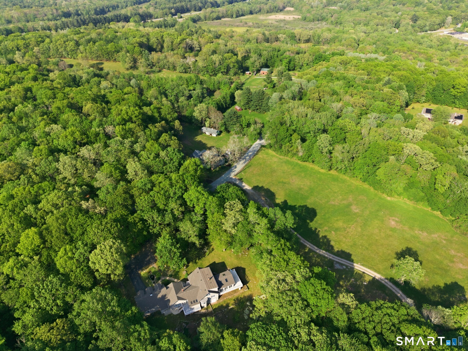 70 Mahoney Road Colchester, CT 06415 - Photo 39 of 40 a view of a garden with an trees