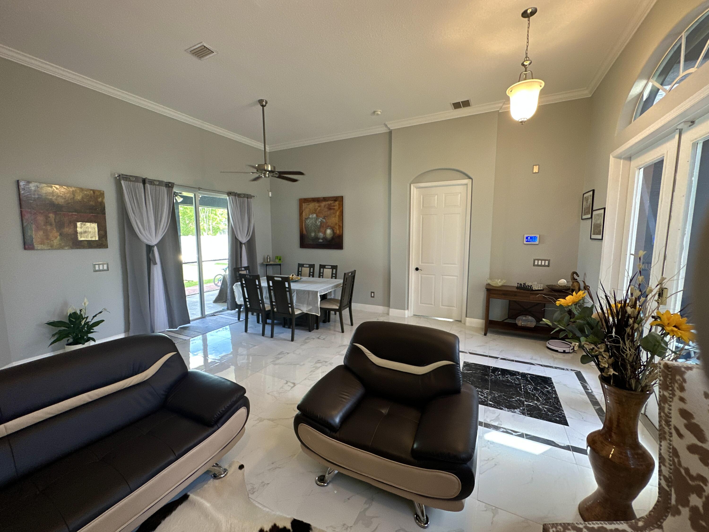 2343 Southwest Salmon Road Port St. Lucie, FL 34953 - Photo 9 of 55 DJI_20230604_101127_337