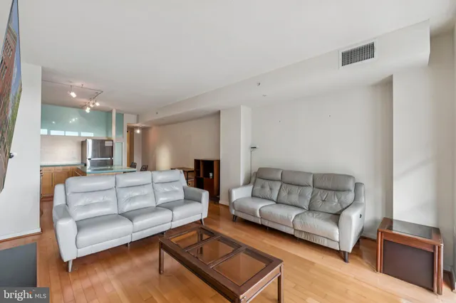 a living room with furniture and a couch