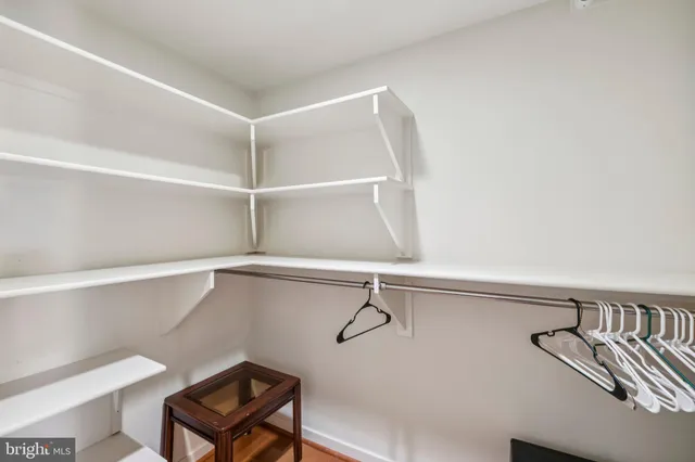 a view of a room with racks on the wall