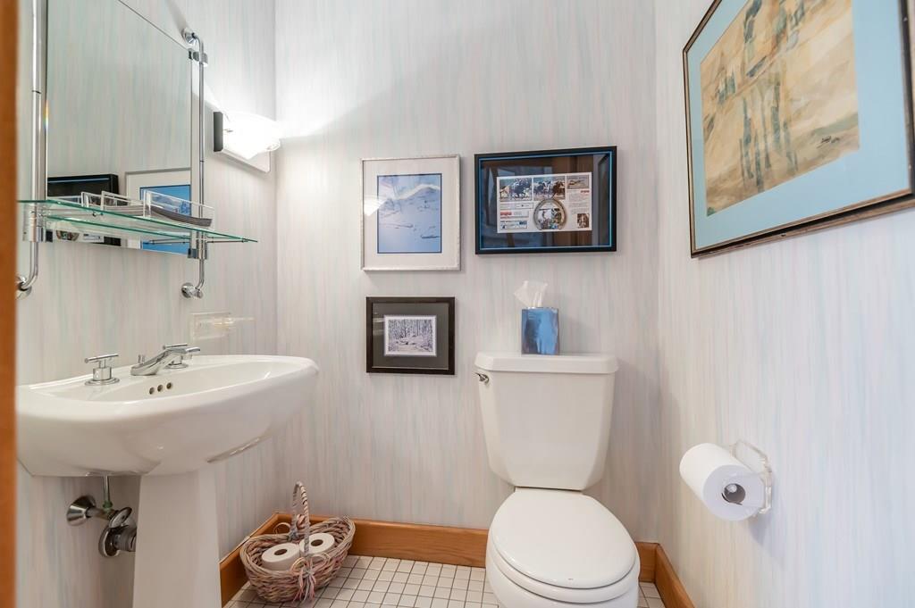 8 Cameron Road Andover, MA 01810 - Photo 12 of 42 a bathroom with a sink mirror and toilet