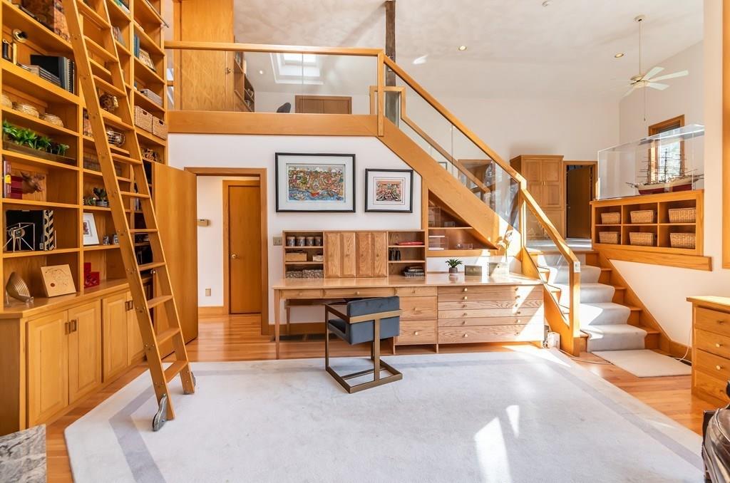 8 Cameron Road Andover, MA 01810 - Photo 14 of 42 a view of hall way with furniture and large windows