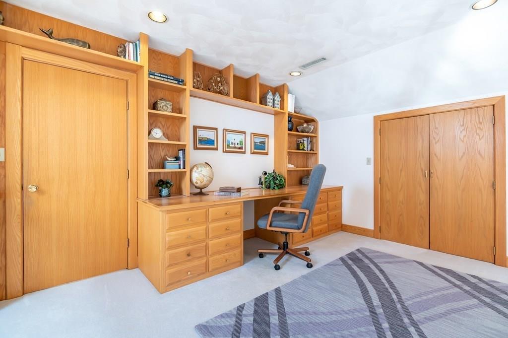 8 Cameron Road Andover, MA 01810 - Photo 16 of 42 a bed room with a bed and a chair