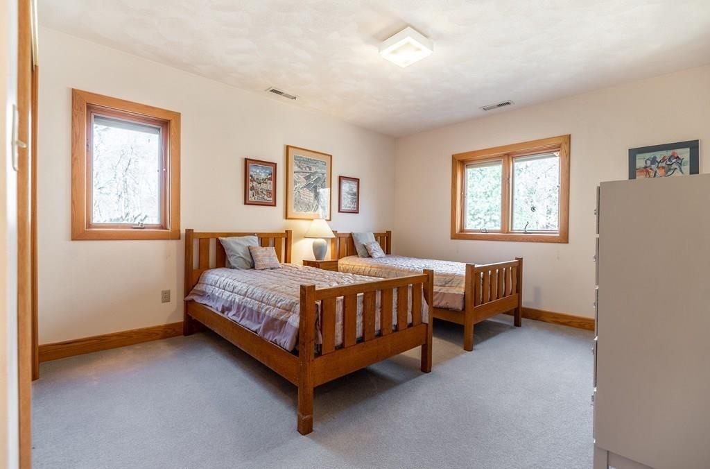 8 Cameron Road Andover, MA 01810 - Photo 20 of 42 a bedroom with a bed and a window