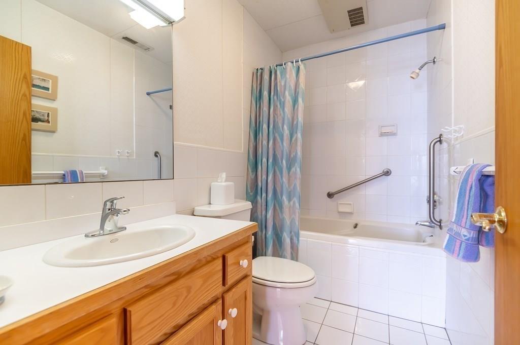 8 Cameron Road Andover, MA 01810 - Photo 21 of 42 a bathroom with a sink toilet and shower