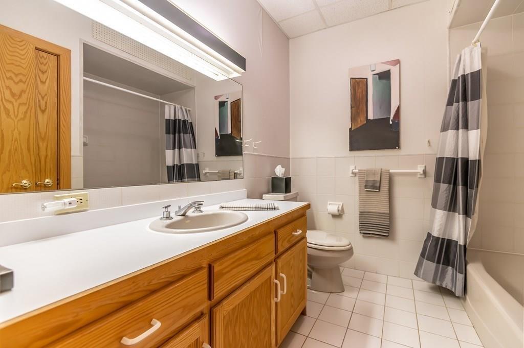8 Cameron Road Andover, MA 01810 - Photo 26 of 42 a bathroom with a sink toilet and shower