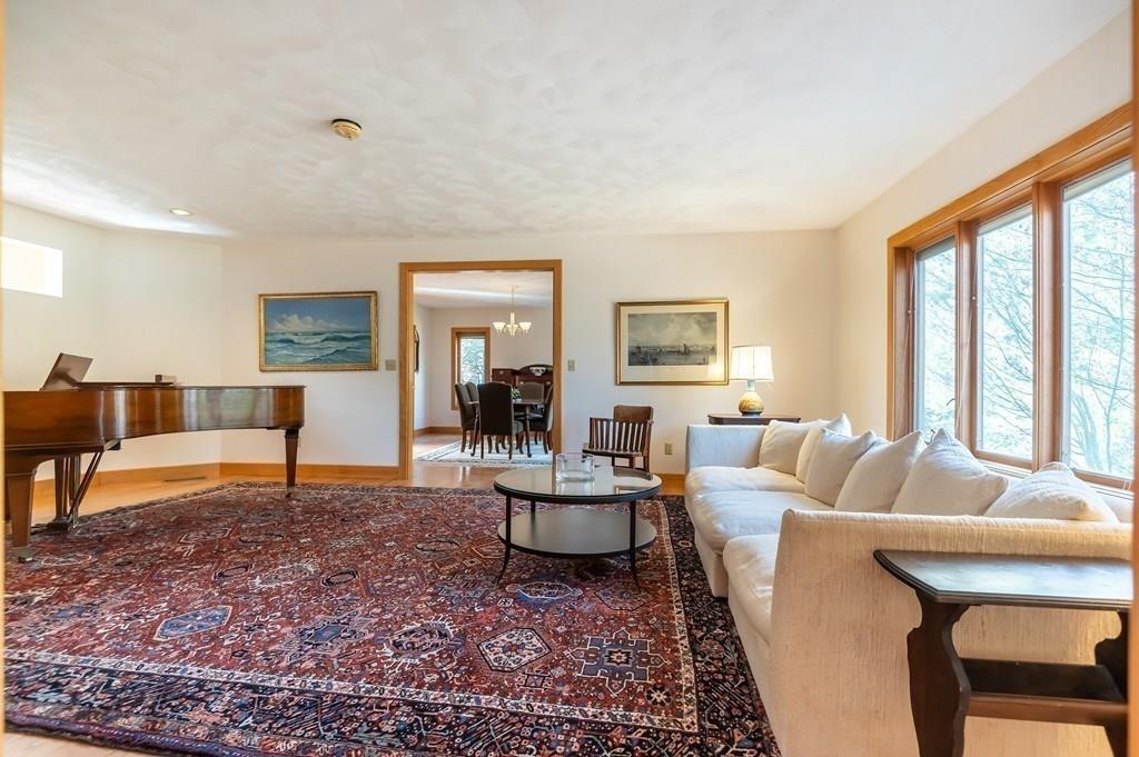 8 Cameron Road Andover, MA 01810 - Photo 35 of 42 a living room with furniture and a large window