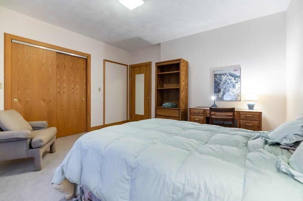 8 Cameron Road Andover, MA 01810 - Photo 40 of 42 a bedroom with a bed and furniture
