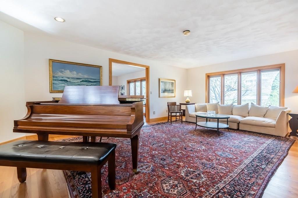 8 Cameron Road Andover, MA 01810 - Photo 5 of 42 a living room with furniture a rug and a large window