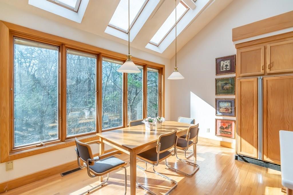 8 Cameron Road Andover, MA 01810 - Photo 8 of 42 a view of a dining room with furniture wooden floor and next to a window