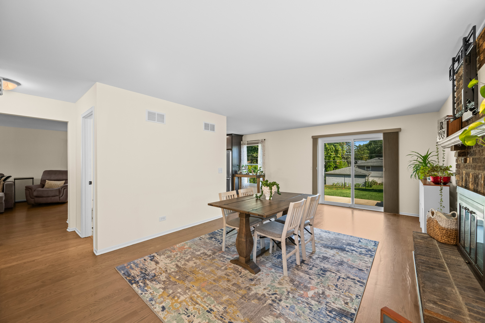 S579 Robbins Street Winfield, IL 60190 - Photo 13 of 36 a living room with furniture and a table