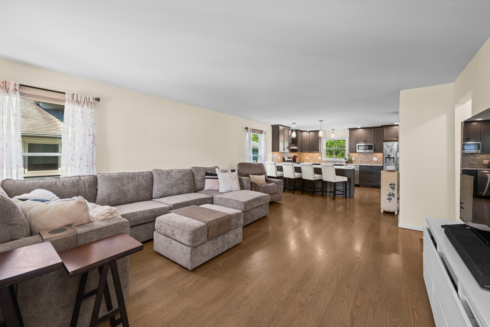 S579 Robbins Street Winfield, IL 60190 - Photo 2 of 36 a living room with furniture and a wooden floor