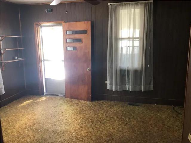 an empty room with windows